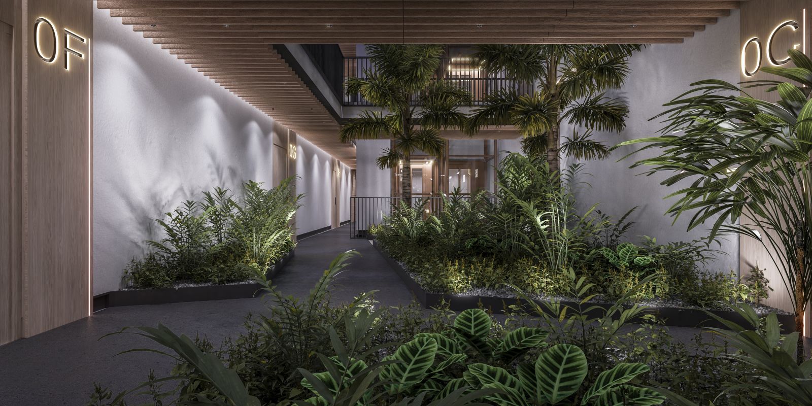 Modern indoor courtyard with lush greenery, palm trees, and wooden ceiling accents.